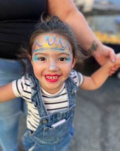 Smiley Kid with Face Paint